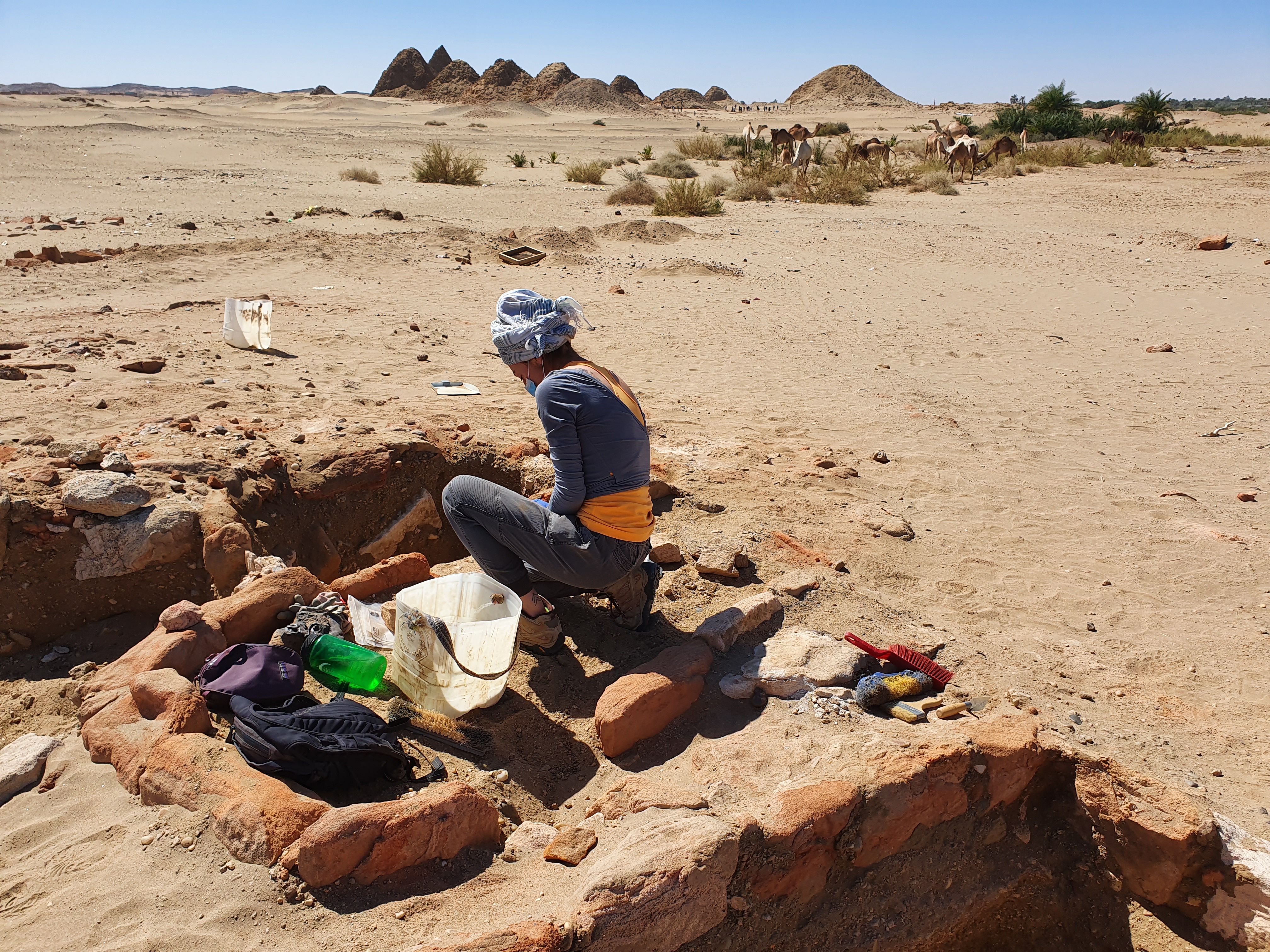 Gretchen Zoeller excavates a burial site in Nuri, Sudan. Photo Credit: Dr. Abagail Breidenstein